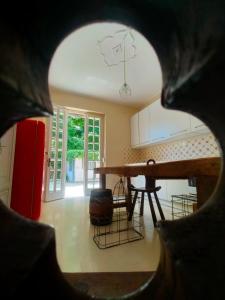 a view of a kitchen with a table at Casa Negrita in Bra +12 photos