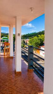 a train station with a view of the tracks at Hotel Mirador Creel in Creel +17 photos