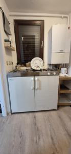a kitchen with a sink and a counter top at See Love 2 in Zagreb