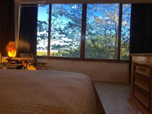 Hotel Casa Maya Calakmul客房内的一张或多张床位