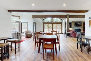 a dining room with tables and chairs at Mountain Modern Escape in Sun Valley
