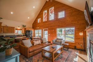 a living room with a couch and a table at Dover Bay Way in Dover