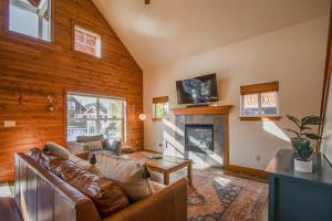 a living room with a couch and a fireplace at Dover Bay Way in Dover