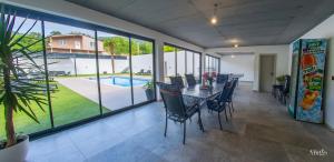 a dining room with a table and chairs at Villa Amor in Mostar