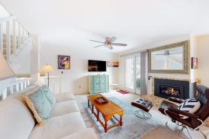 a living room with a couch and a fireplace at Valley Gem Upper in Sun Valley