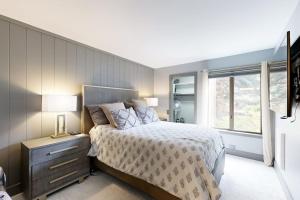 a bedroom with a large bed and a window at Sun Valley Serenity in Sun Valley