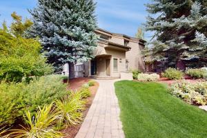 a house with a walkway in front of a yard at Sun Valley Serenity in Sun Valley