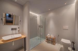 a bathroom with a shower and a toilet and a sink at Dimora in Prato in Padova +92 photos