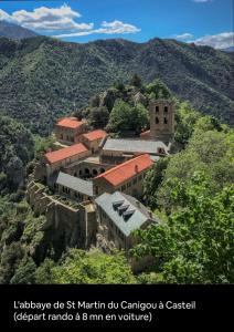 a building on the side of a mountain at Cami del Canigou in Vernet-les-Bains