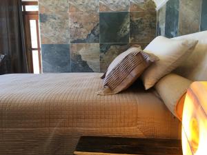 Hotel Casa Maya Calakmul客房内的一张或多张床位