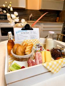 a box filled with different types of food on a table at Ski Vital Apartments in Sankt Michael im Lungau