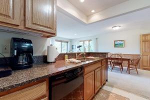 a kitchen with a sink and a counter top at Mountain Vista in Bartlett