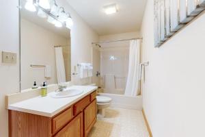 a bathroom with a sink and a toilet at Mountain Vista in Bartlett +48 photos