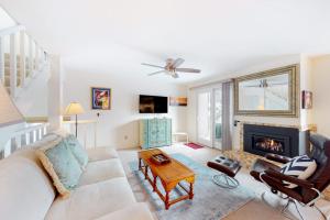 a living room with a couch and a fireplace at Valley Gem Entire Home in Sun Valley