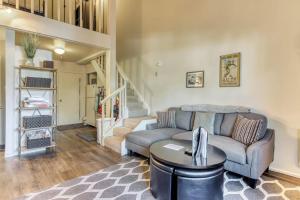 a living room with a couch and a table at Elkhorn Escape in Sun Valley