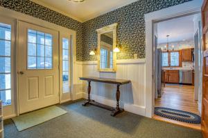 a home office with a table and a mirror at The Greenfield in Bethlehem +61 photos