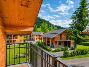 a view from the balcony of a log house at Nockberge in Afritz