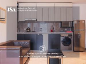 a kitchen with a refrigerator and a washer and dryer at 4StudioAparts RC 01 in Cajamarca