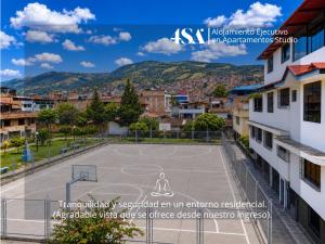 a basketball court in the middle of a city at 4StudioAparts RC 01 in Cajamarca