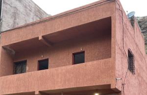 a brick building with a large opening on the side at DAR LAHCEN - Terrace & Mountain View in Ourika