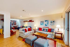 a living room with two couches and a table at Lake View by the Mountain in Bridgton +78 photos