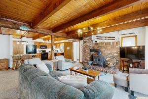 a living room with a couch and a fireplace at Casa Bear Cub in Bartlett