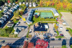 an aerial view of a parking lot with a tennis court at Splash & Relax Unit 203 in Wells