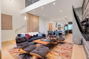 a living room with a couch and a table at Glenwood Excellence in Jackson