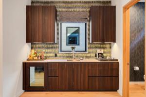 a kitchen with a sink and a window at Glenwood Excellence in Jackson +74 photos