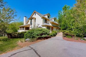a house with a driveway in front of it at Chipper View in Jackson
