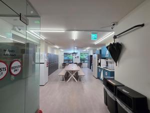a conference room with a table in the middle of it at Solo Stay Myeongdong in Seoul