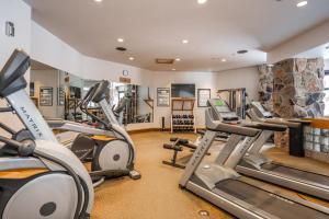 a gym with treadmills and elliptical machines at Shoshone 1909 in Big Sky
