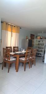 a dining room with a table and chairs at CasaMia in San Pablo