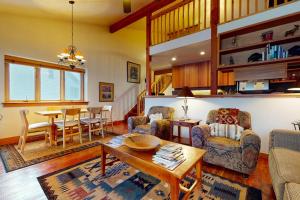 a living room with a couch and a table at 1123 Indian Paintbrush in Wilson