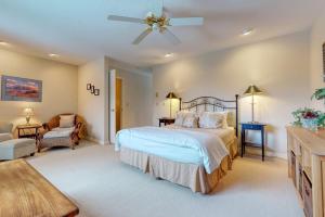 a large bedroom with a bed and a couch at Moran B in Jackson