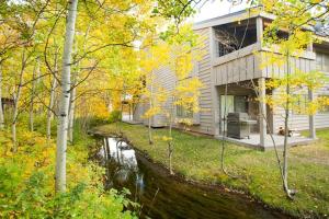 a house with a river in front of it at 5123 Foxtail in Wilson