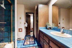 a bathroom with a sink and a shower at Granite A in Jackson +71 photos