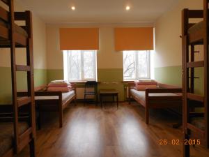 Postel nebo postele na pokoji v ubytování Gogol Park