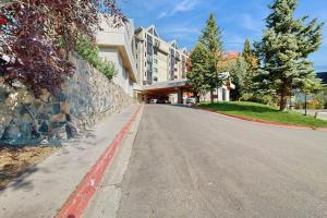 an empty street in front of a building at Shoshone 1917 in Big Sky