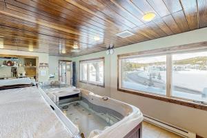a hospital room with a bed and a window at Big Horn 18 in Big Sky +57 photos