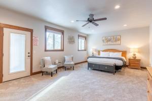 a bedroom with a bed and a ceiling fan at Fox Trail in Columbia Falls