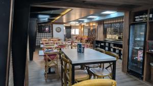 a dining room with tables and chairs at Hotel SPA GBC Avenida Pontevedra in Pontevedra