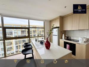 a kitchen with a counter with a vase on it at C04-Summerfield Stylish 2BR Apart, Mountain view in Weston Creek