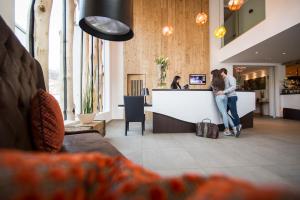 TV a/nebo společenská místnost v ubytování Hotel Ciasa Soleil