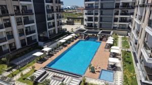 an overhead view of a swimming pool in a building at Eliz Paradise By Panjur in Alanya
