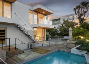 an image of a house with a swimming pool at Stillpoint Retreat in Motungarara