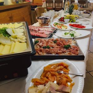 a long table with many different types of food at Gasthaus zur Krone in Weingarten (Karlsruhe)