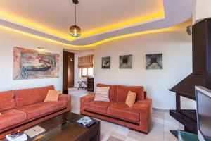 Posezení v ubytování Cavo Seaside Suites