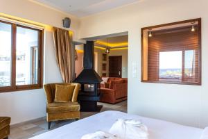 Posezení v ubytování Cavo Seaside Suites
