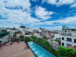 a view of a city from the roof of a building at Eliana Robusta Hotel in Hanoi